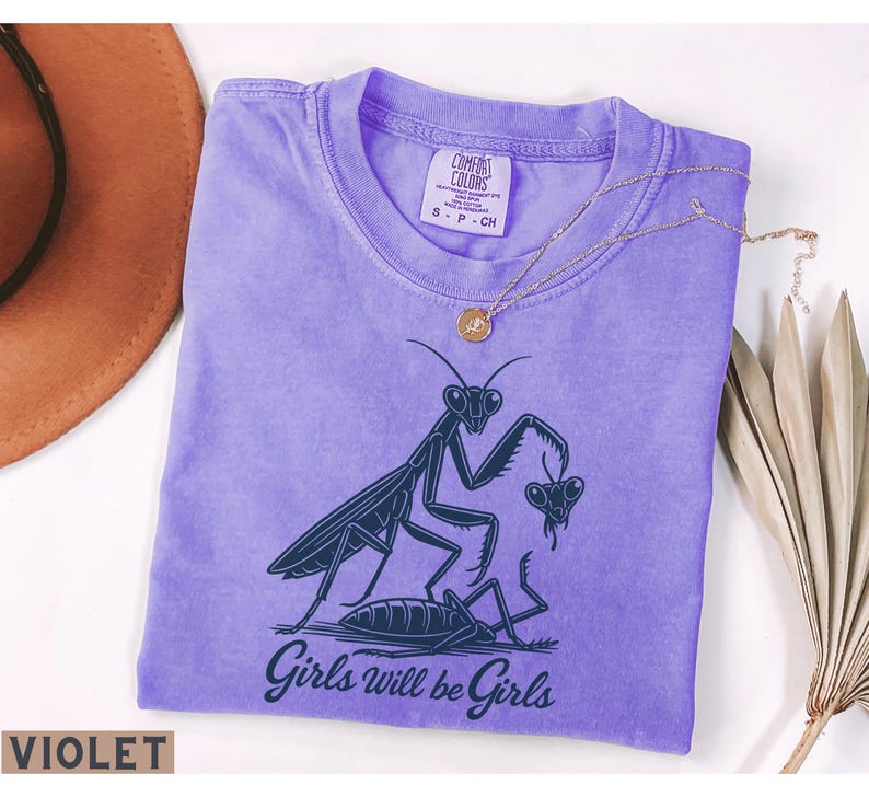 Girls Will Be Girls praying mantis shirt by The NY Bach Label on a Violet Comfort Colors 1717 tee.