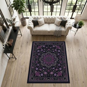 May include: A rectangular area rug featuring a dark black background with a central purple floral mandala pattern, surrounded by a decorative border of roses, vines, and small crescent moon symbols in shades of purple, lavender, and white.