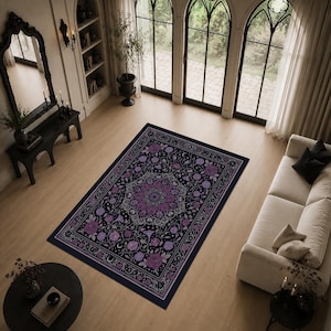 May include: A rectangular area rug featuring a dark navy blue background with a central mandala pattern composed of purple roses and intricate white floral line work, surrounded by a decorative border of matching purple flowers and vines.