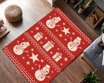 May include: A rectangular red Christmas rug featuring a repeating pattern of snowmen, gift boxes, and stars in cream. The rug has a white zigzag border and is placed on a wooden floor.