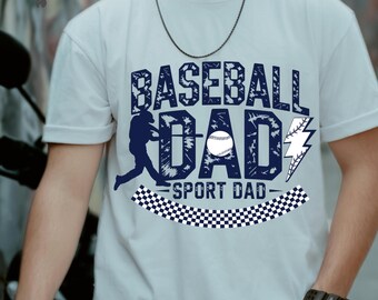 May include: A white t-shirt with a blue and white graphic design that says "Baseball Dad" with a baseball and lightning bolt. The text "Sport Dad" is below the graphic.