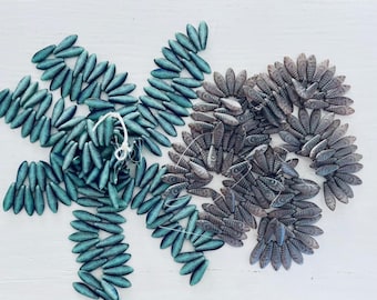 Czech 5x16 Laser Feathers matte green turquoise or Tanzanite matte laser eye daggers