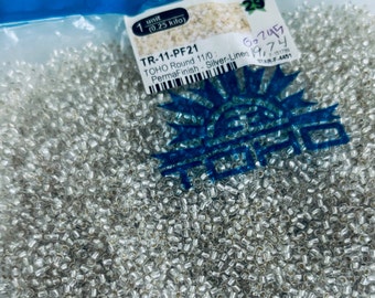 Seed bead 250gm bag 11/0 Perma Finish Silver Lines Crystal PF21 Toho