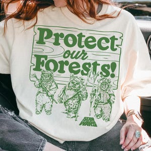 Puede incluir: Un letrero de madera rústica con el texto "Welcome to our home" en letras blancas. El letrero presenta un acabado envejecido y un diseño sencillo y acogedor, ideal para un porche o entrada.