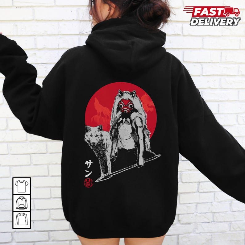 May include: Black hoodie featuring a graphic of a wolf and a figure with a red mask in front of a red circle. Japanese text is below the wolf. The hoodie has a drawstring hood and long sleeves. The words "Fast Delivery" are printed on the upper right.