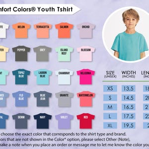 May include: A Comfort Colors youth t-shirt in various colours, including white, melon, and red. The image shows a size chart with measurements in inches, and a young person wearing a turquoise shirt. The text reads "Comfort Colors&reg; Youth Tshirt."
