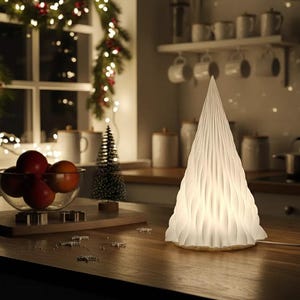 May include: A white, cone-shaped lamp with a textured, pleated design, resembling a Christmas tree. The lamp is illuminated, casting a warm glow. The scene includes a bowl of apples, a small Christmas tree, and festive decorations, creating a cozy holiday atmosphere.