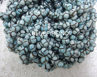 37 cuentas de ágata tibetana azul y negra facetadas redondas de 10 mm