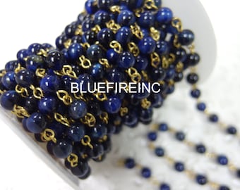 3 feet long, 6mm blue tigers eye beads with gold color wire chain
