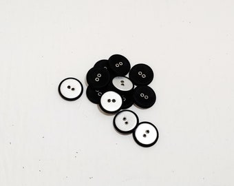 30 lijnen, met zwart leer beklede knopen met zilveren oogjes die zijn doorgestikt (12 stuks) 19 mm . of 19 mm