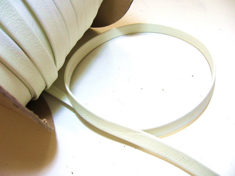 DISCOUNTED ITEM 58 Double-Folded with Reinforcement Damaged Cowhide Strap in Yellowed White 5 YDS 0625RD