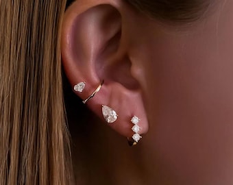 Pendiente tipo ear cuff con diamante de laboratorio talla pera, oro macizo de 14 quilates, delicado, sin perforación.
