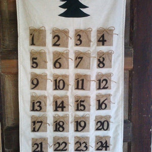 Advent Calendar Brown packages tied up with string. Vintage Buttons, flannel and felt
