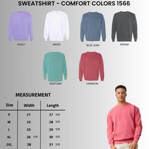 Puede incluir: Una selecci&oacute;n de sudaderas Comfort Colors 1566 en varios colores, incluyendo violeta, blanco, azul vaquero, pimienta, espuma de mar y carmes&iacute;. La imagen tambi&eacute;n muestra una tabla de medidas con tallas de la S a la 2XL, con anchos de 53 cm a 71 cm y largos de 70 cm a 80 cm.