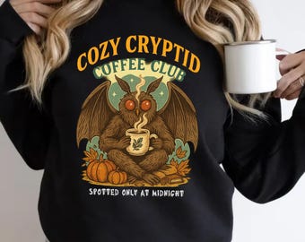 Cozy Cryptid Coffee Club Sweatshirt, Mothman Coffee Shirt, Cute Bigfoot Tee, Spooky Cute Fall Pullover, Vintage Halloween Gift