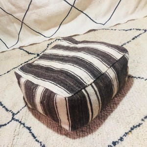 Morocco rug pouf bedroom, vintage sheepskin floor seating, berber footstool living room, black seat cushion, traditional meditation cushion