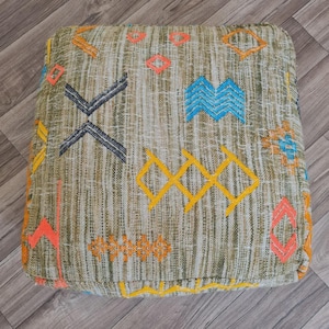 moroccan rug pouf bedroom, vintage sheepskin floor seating, berber footstool living room, kilim seat cushion, traditional meditation cushion