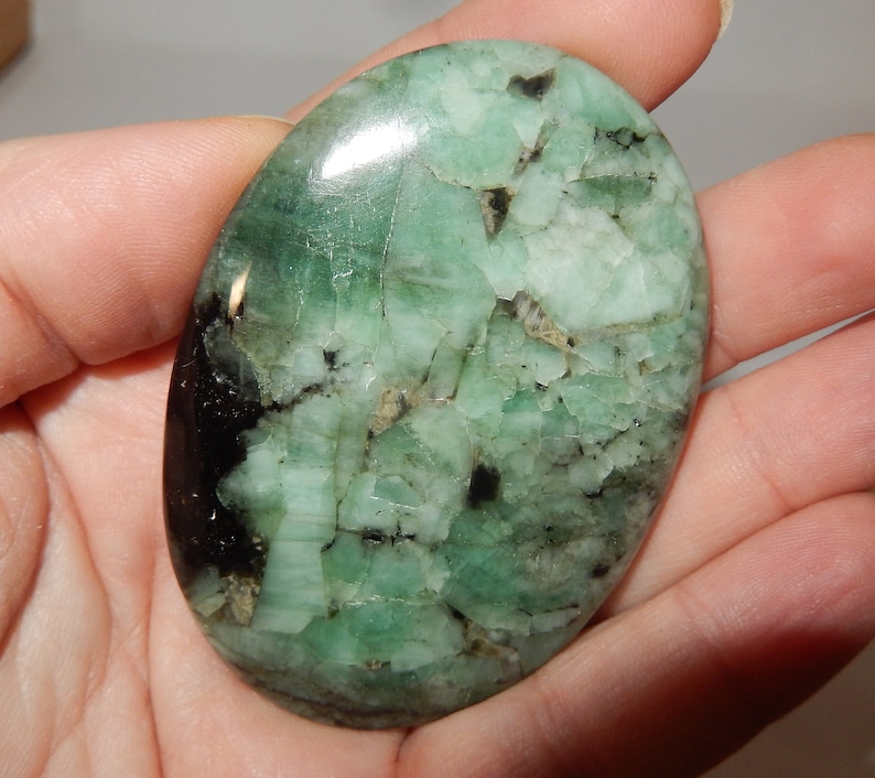 Emeralds in schist palm image 2