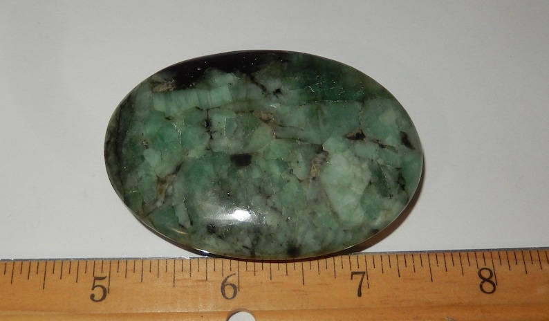 Emeralds in schist palm image 5