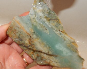 Ocean Picture Stone - rough end cut slab with one edge of druzy quartz