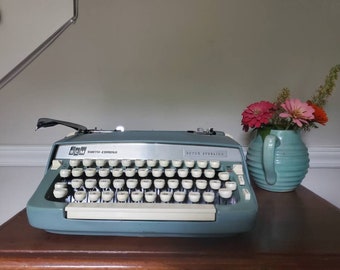 Stunning 1970 Vintage Smith Corona Super Sterling Typewriter, Working Guarantee, with case and Lifetime Tradein Policy. A+