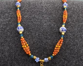 Handmade Orange and Blue Beaded Necklace for Women with Golden Flower Charm