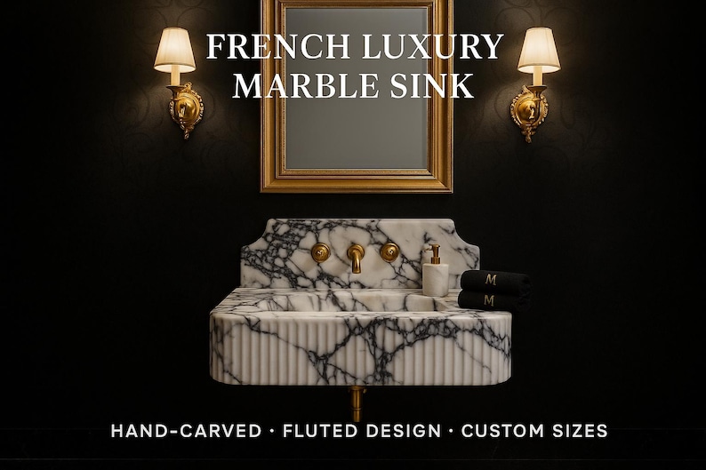 May include: A luxury marble sink with a fluted design, featuring a white and black marble pattern. The sink has gold fixtures and is mounted below a gold-framed mirror. The text "FRENCH LUXURY MARBLE SINK" is displayed above the sink.