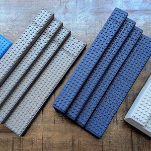 MEGA LEGO Minifigura (36 piezas de ancho) Soporte de exhibición Portátil Madera maciza Sin ensamblaje Coleccionable Almacenamiento Hecho en EE. UU. 4 colores disponibles