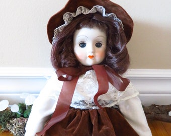 Vintage bisque porcelain doll collectible medium size victorian dressed  14" Pioneer Brown Hair blue Eyes