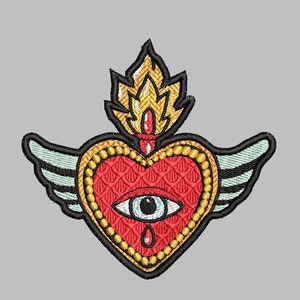 May include: Embroidered patch with a red heart with a single eye and a teardrop, surrounded by a gold frame and wings. The heart is on fire with yellow flames.