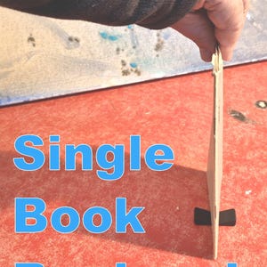 Single Book Bookend, Thin Booklet Support, minimal book stop, literary self-centering bracket, discreet attachment