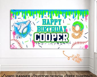 May include: A rectangular vinyl banner featuring a white background with bright green slime dripping from the top edge. The text reads HAPPY BIRTHDAY COOPER in blue and black. A baseball, bats, and the number 9 are decorated with green slime.