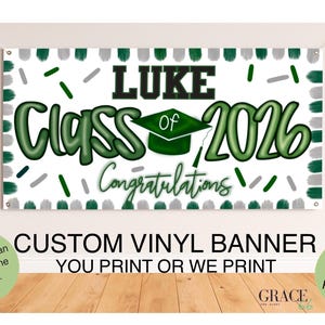 May include: A white vinyl banner with the text "LUKE Class of 2026 Congratulations" in green and black. The banner includes a graduation cap graphic and the text "CUSTOM VINYL BANNER YOU PRINT OR WE PRINT".