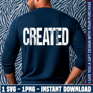 Puede incluir: Suéter azul marino con la palabra "CREATED" en fuente blanca desgastada en la espalda, con "WITH A PURPOSE" alineado verticalmente dentro de la "E". La parte inferior de la imagen tiene el texto "1 SVG - 1PNG - INSTANT DOWNLOAD".