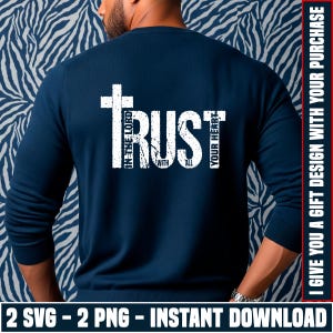 Puede incluir: Suéter azul marino de manga larga con la palabra "TRUST" en blanco, con una cruz y las frases "IN THE LORD", "WITH ALL" y "YOUR HEART". La parte inferior de la imagen dice "2 SVG - 2 PNG - INSTANT DOWNLOAD".
