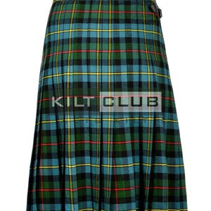 May include: A green, blue, black, and yellow plaid kilt with the text "KILT CLUB". The kilt has pleats and leather buckle closures. The kilt is a traditional Scottish garment.