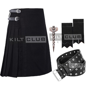 May include: A black kilt with a matching belt, kilt pin, and two black kilt straps. The kilt has two leather straps with buckles. The belt is black leather with silver eyelets. The kilt pin is a decorative thistle design.