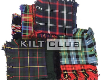 May include: A collection of tartan scarves in various colors and patterns. The scarves feature fringed edges and a classic plaid design. The image includes the text "KILT CLUB".