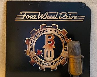 B.T.O. "Four Wheel Drive" Bachman Turner Overdrive Vintage Vinyl Record Album LP 1970's Classic Rock and Roll Electric Guitar (1975 Mercury)