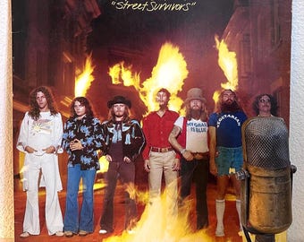 Lynyrd Skynyrd "Street Survivors" (ORIGINAL Recalled Flame Cover FIRST PRESSING) Vinyl Record 1970s Classic Rock Gary Rossington (1977 Mca)