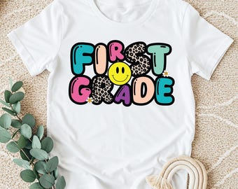 First Grade Teacher Shirt: Colorful Team Design