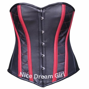May include: Black corset with red detailing and stitching. The corset has a diamond-stitched pattern on the sides and red vertical stripes. The text "Nice Dream Girl" is printed at the bottom.