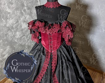 May include: A black gothic-style dress on a mannequin. The dress features a burgundy corset with lace detailing, a high collar, and matching lace trim. The skirt is full and flowing, with a satin-like sheen. The Gothic Whisper logo is visible.