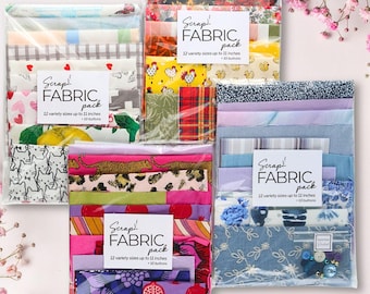 May include: Four clear plastic packages containing assorted fabric scraps in various colors and patterns, each labeled Scrap FABRIC pack 12 variety sizes up to 11 inches + 10 buttons. The fabric bundles feature floral, animal, and geometric prints.