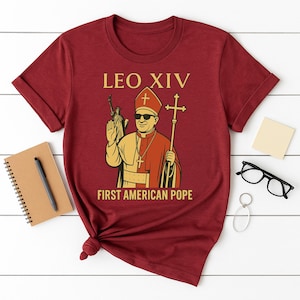 Leo XIV First American Pope Shirt, Funny Cartoon Pope Graphic Tee, Satirical Catholic T-shirt, Statue of Liberty Design