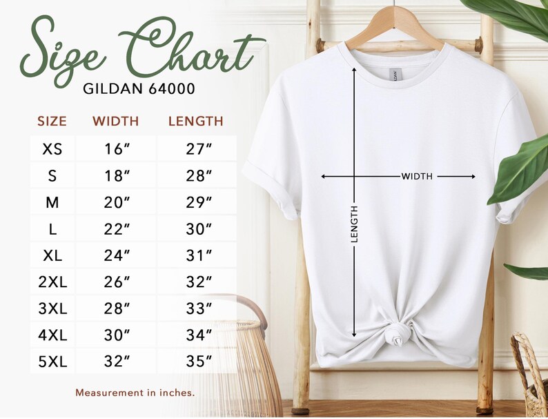 May include: A white Gildan 64000 t-shirt hangs on a wooden hanger. The image includes a size chart with measurements in inches: XS (16" width, 27" length) to 5XL (32" width, 35" length). The chart is labeled "Size Chart".