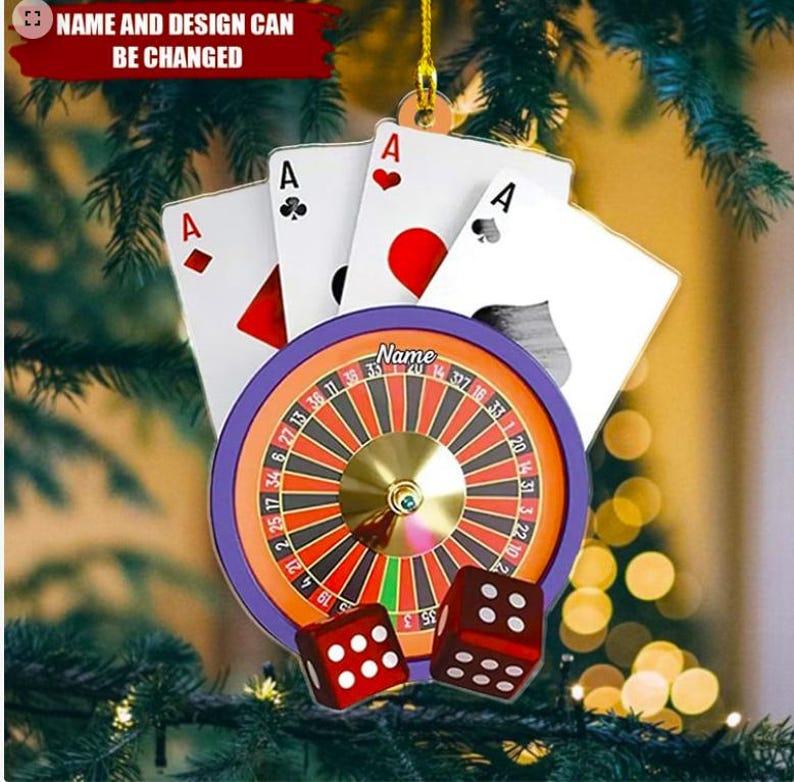 May include: Casino-themed Christmas ornament featuring a roulette wheel, dice, and playing cards. The ornament includes four Ace playing cards, a roulette wheel with a purple border, and two red dice. The text "Name and Design Can Be Changed" is at the top.