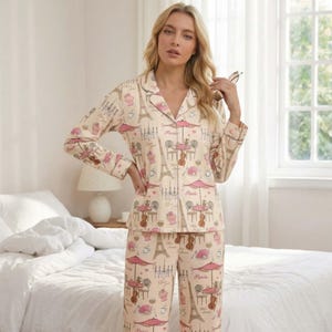 May include: A set of three ceramic mugs with a speckled, matte finish in cream, light grey, and dark grey. Each mug has a simple, minimalist design and a rounded handle.