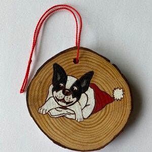 French Bulldog (or Boston Terrier), dog, Christmas, in Santa hat