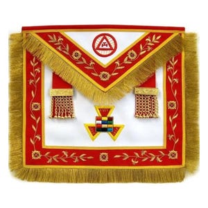 May include: A white and red masonic apron featuring gold fringe trim and embroidery. The triangular flap displays a red circle emblem with a central symbol. The body includes two gold chain tassels and a central emblem with a colorful grid of squares.